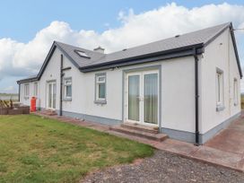 A house with steps and windows at Carrowmore North in Doonbeg, County Clare