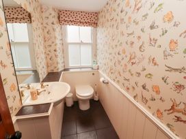 A bathroom with a sink and toilet at Bracken Howe in Ambleside