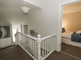 A hallway leading to a bedroom at Station Hall in Cilgerran