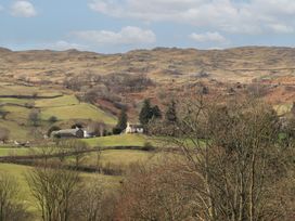 A landscape view with hills and fields at Haystacks in Troutbeck