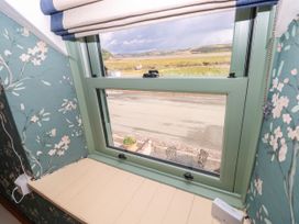 A window with a view of the outdoors at 2 Strand Cottages Laugharne