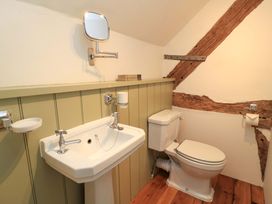A bathroom with a sink and toilet at 8 Gloucester Street in Winchcombe