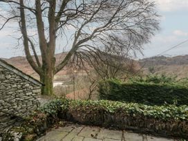 A view of trees and hills from the property at Brockstones Grasmere