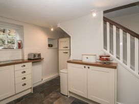 A kitchen with appliances and storage at Brockstones Grasmere