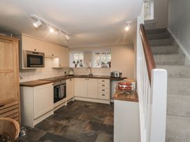 A kitchen with cabinets and appliances at Brockstones in Grasmere