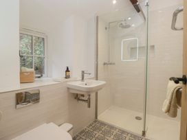 A bathroom with a shower and sink at Brockstones Grasmere