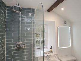 A bathroom with a shower and toilet at Brockstones in Grasmere
