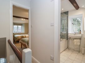 A landing with a view of a bedroom and a bathroom at Brockstones in Grasmere