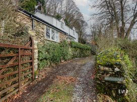 A pathway leading to a house with a gate at Brockstone in Grasmere