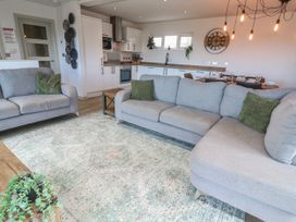 A living room with a sofa and coffee table at Bay View in Portreath