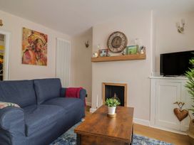 A living room with a sofa and coffee table at 6 Bedford Place in Bridport