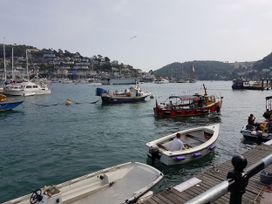 Boats in water at a harbor at Driftwood in Dartmouth