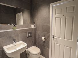 A bathroom with a sink and toilet at Waterfall in Ambleside