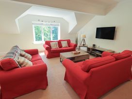 A living room with sofas and coffee table at Waterfall in Ambleside