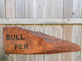 A wooden sign with the text Bull Pen at The Bull Pen in Yeovil, Somerset