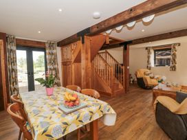 A dining room with a table and chairs at The Bull Pen in Yeovil, Somerset