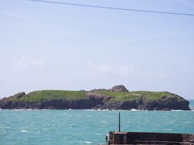 An island surrounded by water at Rowena in Mullion