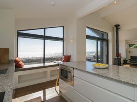 A kitchen with a window and countertop at Driftwood Cottage in Ulverston