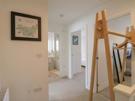A hallway with a map on the wall at Inishnee House in Shotley Gate
