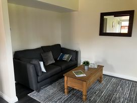 A living room with a sofa and coffee table at Ramson in Saltburn-By-The-Sea