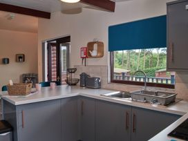 A kitchen with a sink and toaster at Ramson in Saltburn-By-The-Sea