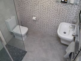 A bathroom with a toilet and bidet at Ramson in Saltburn-By-The-Sea