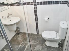 A bathroom with a sink and toilet at Cowslip Saltburn-By-The-Sea