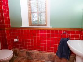 A bathroom with a toilet and sink at Bryn Isaf in Swyddffynnon near Pontrhydfendigaid