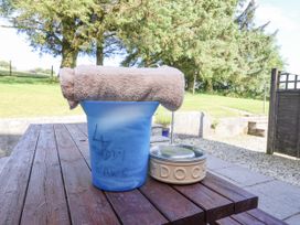A bucket with a towel and a pet food bowl at The Dairy Common Moor near Liskeard