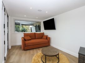 A living room with a couch and coffee table at The Bay in Benllech