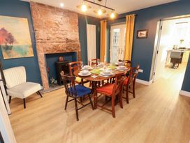 A dining room with a table and chairs at 10 Keekle Terrace in Keekle near Cleator Moor