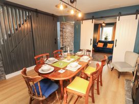 A dining room with a table and chairs at 10 Keekle Terrace in Keekle near Cleator Moor