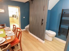 A dining room with a table and chairs at 10 Keekle Terrace in Keekle near Cleator Moor