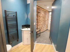 A bathroom with a toilet and hand basin at 10 Keekle Terrace in Keekle near Cleator Moor