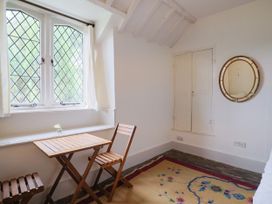 A room with a table and chairs at Hole House in Branscombe