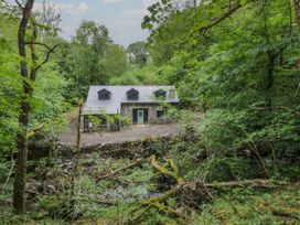 A house surrounded by trees at Frongoch Old Power House in Dolgellau
