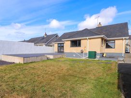 A house with a garden and deck at Morannedd in Morfa Nefyn