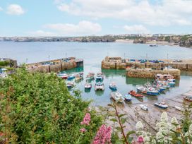 A view of boats in a harbor at Beach View House Newquay