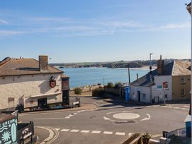 A coastal view with houses and a roundabout at Beach View House Newquay
