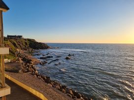 View of the sea and rocks at Sea View Beach Apartment in Thurlestone