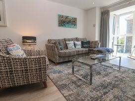 A living room with a couch and coffee table at The Trick in Carbis Bay