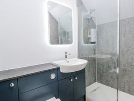 A bathroom with a sink and shower at Claife Flights Bowness-On-Windermere