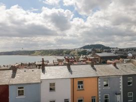 A view of rooftops and the ocean at Number 33 Scarborough