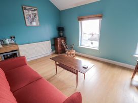 A living room with a sofa and coffee table at Number 33 Scarborough