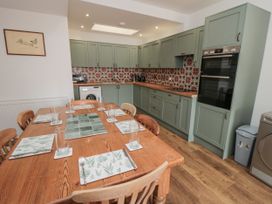 A kitchen with a dining table and chairs at Number 33 in Scarborough