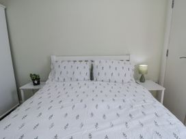 A bedroom with a bed and bedside table at Number 33 in Scarborough