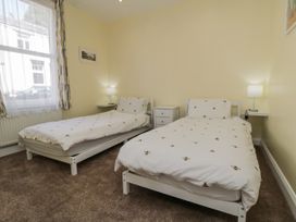 A bedroom with two single beds at Number 33 in Scarborough