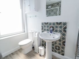 A bathroom with toilet and sink at Number 33 Scarborough