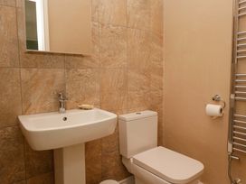 A bathroom with a sink and toilet at 28 Rock Villas Carnforth