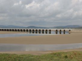 A bridge over a river with sand banks at 28 Rock Villas Carnforth